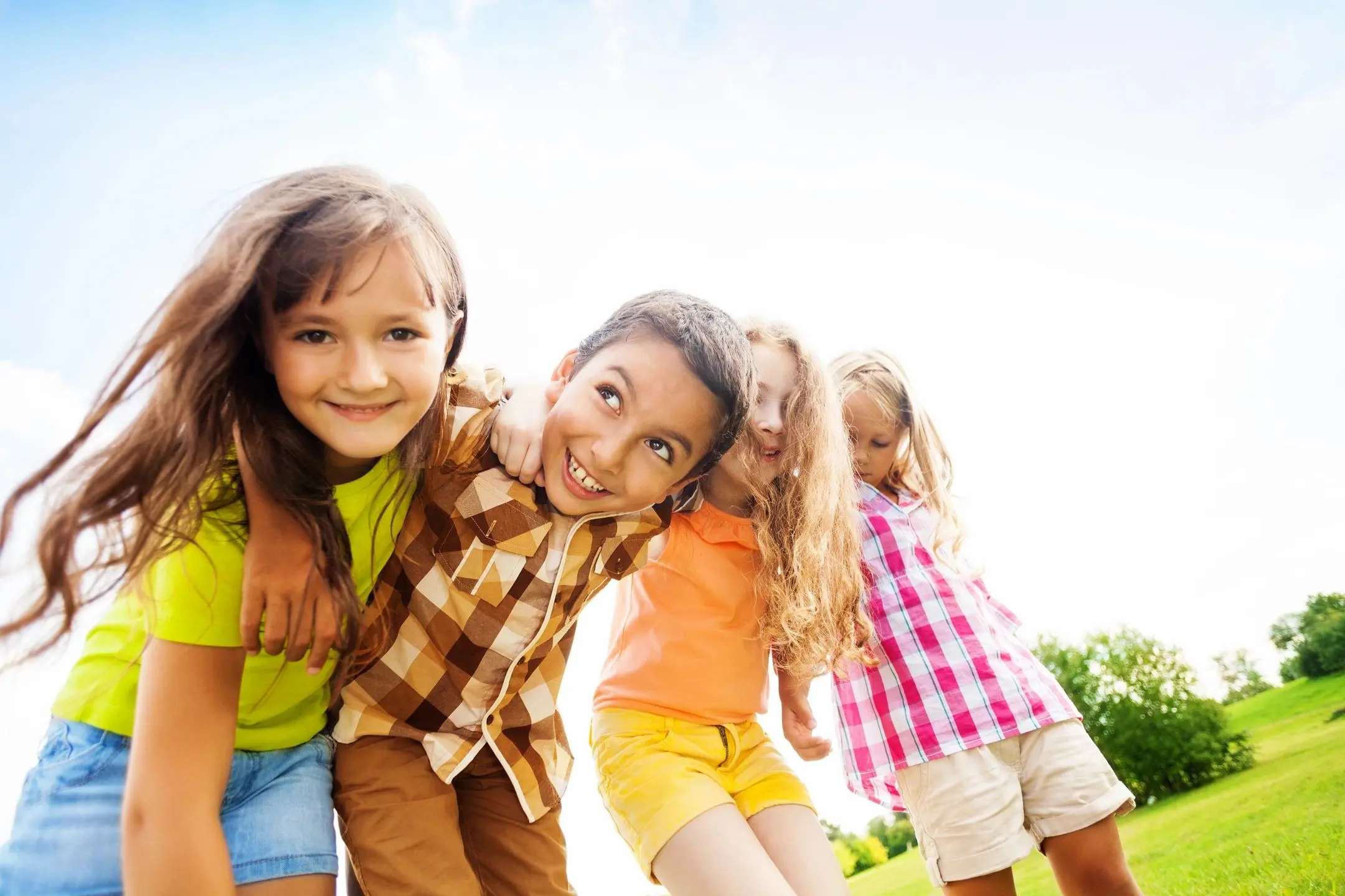 A group of children standing next to each other.